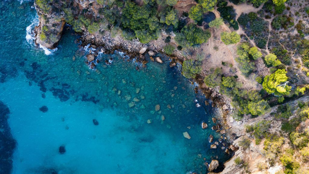 A stunning aerial coastline view of Marseille, France, featuring turquoise waters.