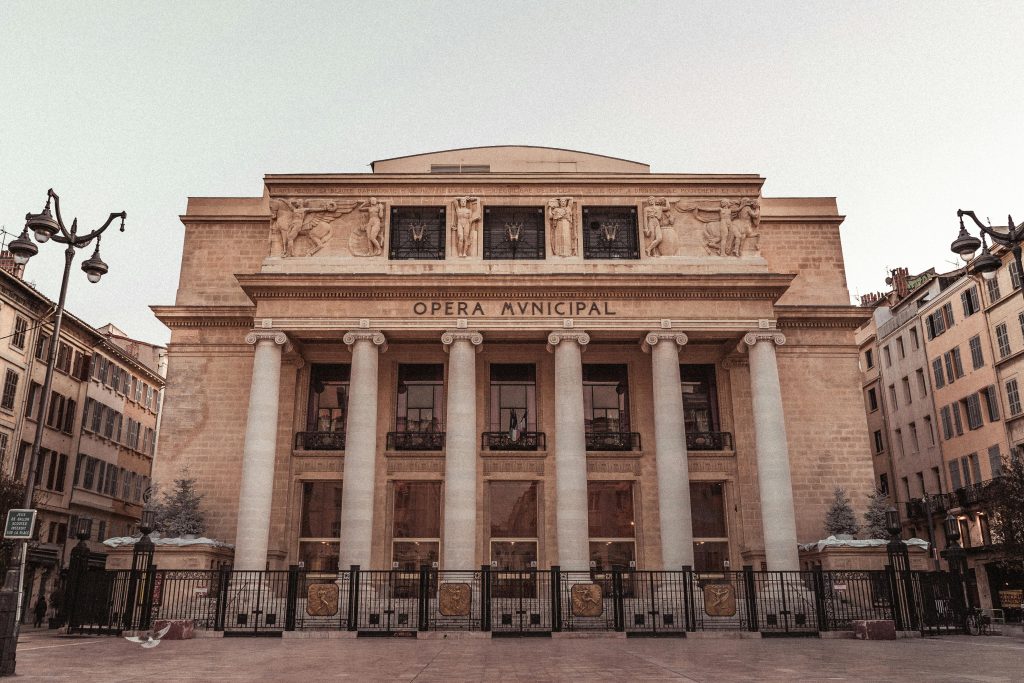Beautiful historic facade of the Opera Municipal in Marseille captured in dawn's soft light.